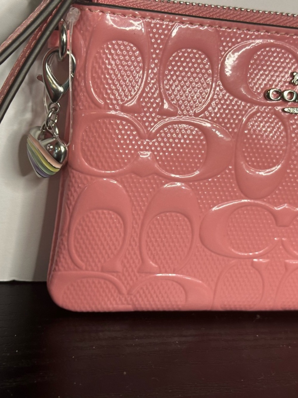 Corner Pink Patent Zip Embossed Wristlet In Signature Leather With Heart Charm - Picture 5 of 9